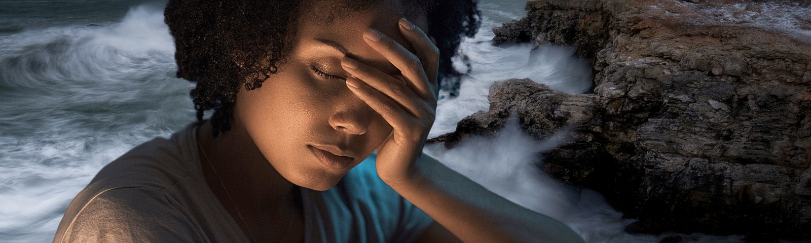 Close up of young black woman grimacing with insomnia, in front of a backdrop of stormy seas.