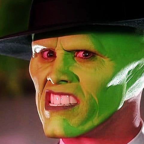 Bewildered face of Jim Carrey in the movie “The Mask”.