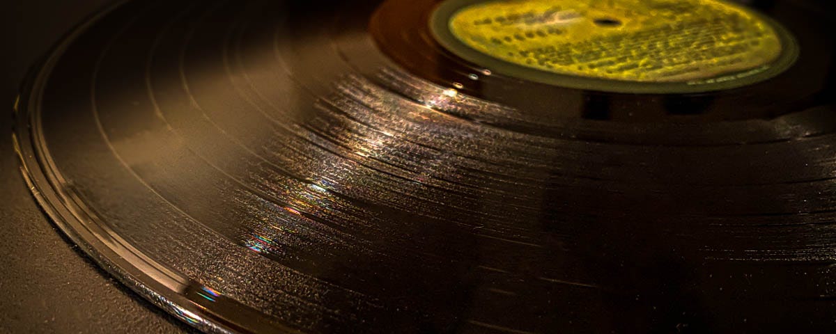 A close-up of the tracks on a vinyl record, disc 1 of The Beatles’ White Album