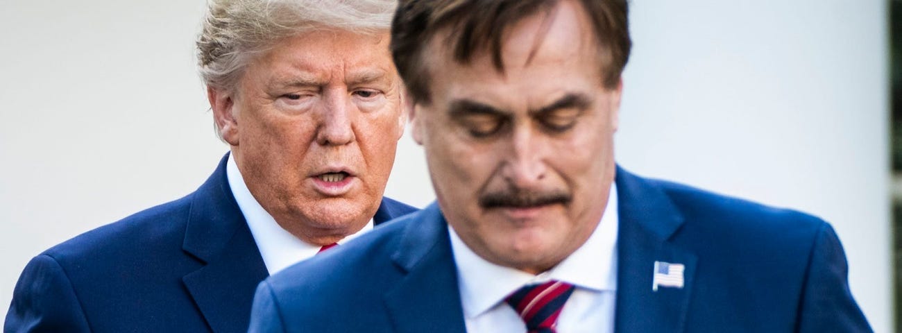 Former President Donald Trump with MyPillow CEO Mike Lindell.