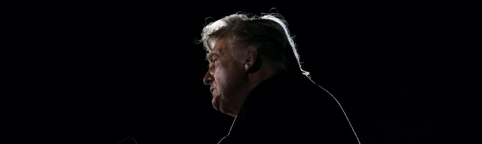 Then-President Donald Trump addresses a campaign rally in Dalton, Georgia, US, on January 4, 2021.