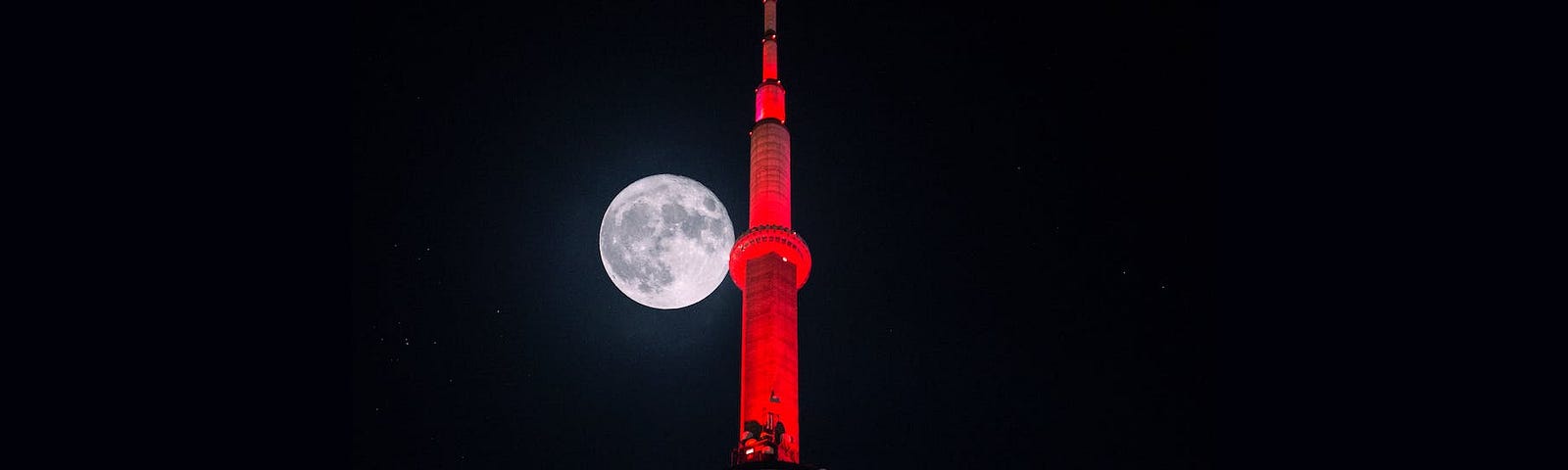 Low-angle Photography of Red and White Tower