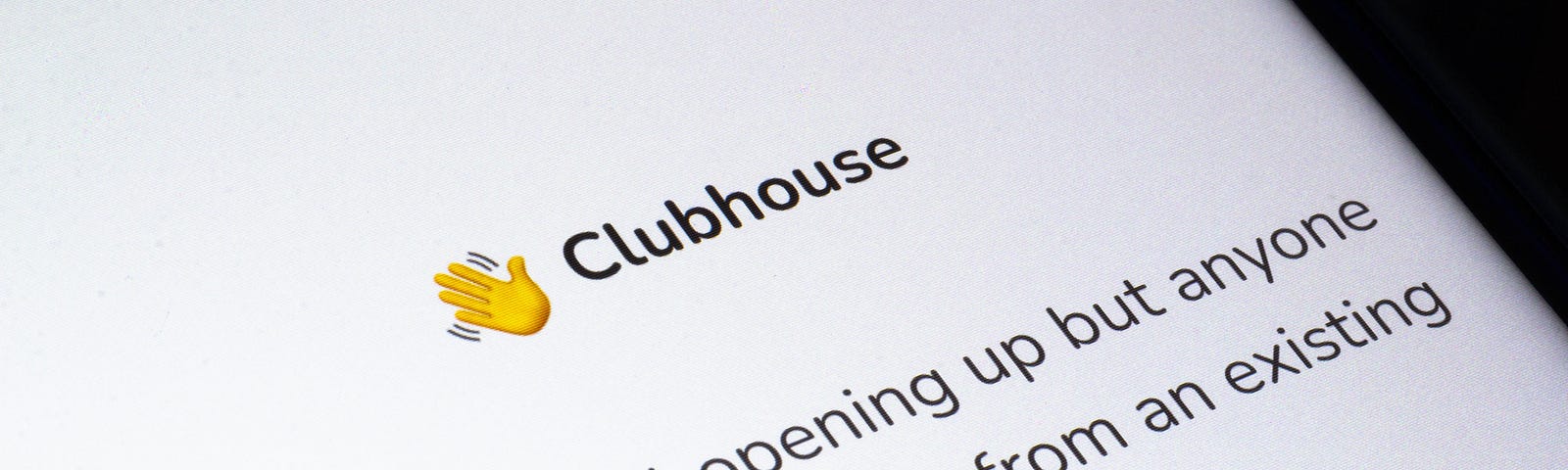 In this photo illustration, the message “Hey we’re still opening up but anyone can join with an invite from an existing user!” for Clubhouse’s waitlist is seen displayed on a smartphone screen