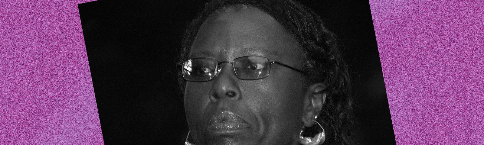 Black and white photo of Gloria Naylor against a violet background.