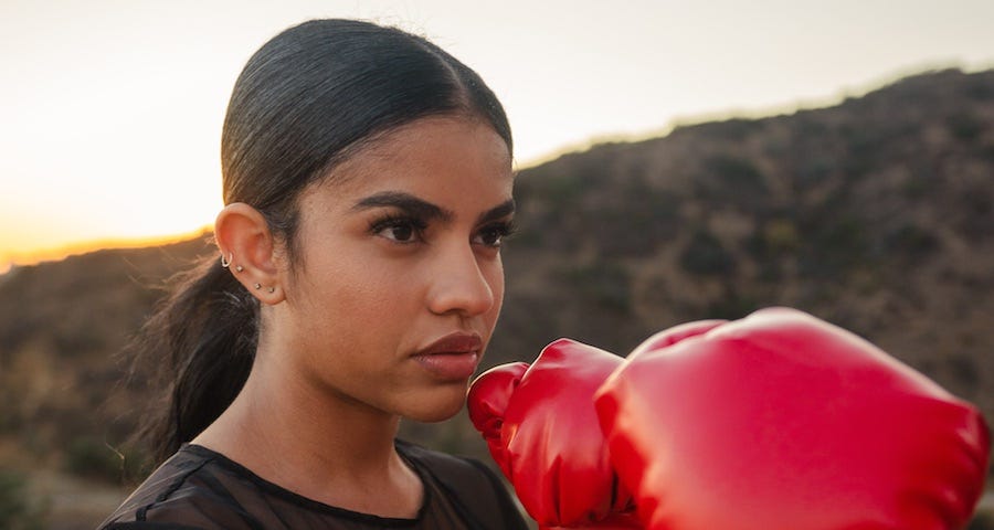 Young lady with boxing gloves