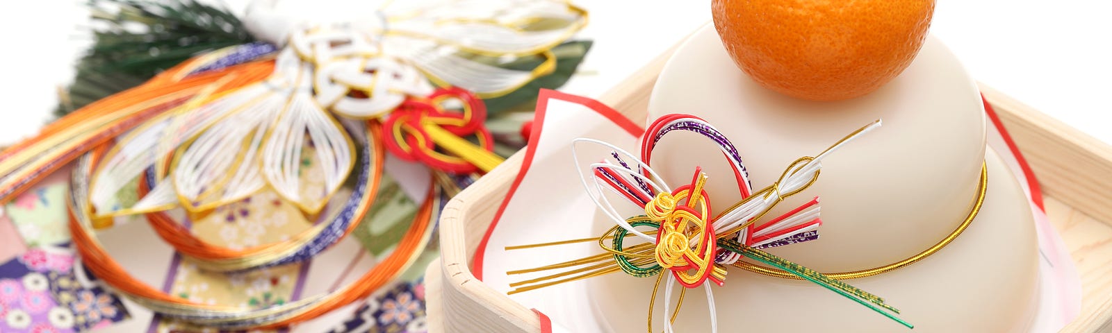 Japanese New Year’s decorations, including kagami mochi which will be broken and eaten.