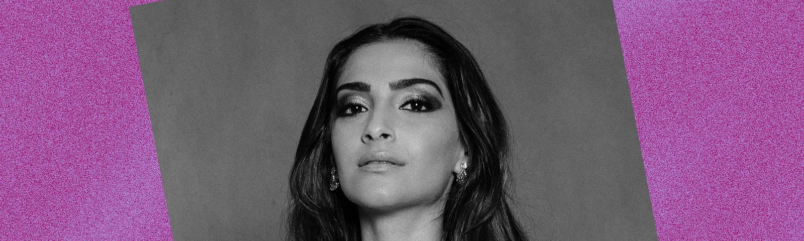 Black and white photo of Sonam Kapoor against a violet background.