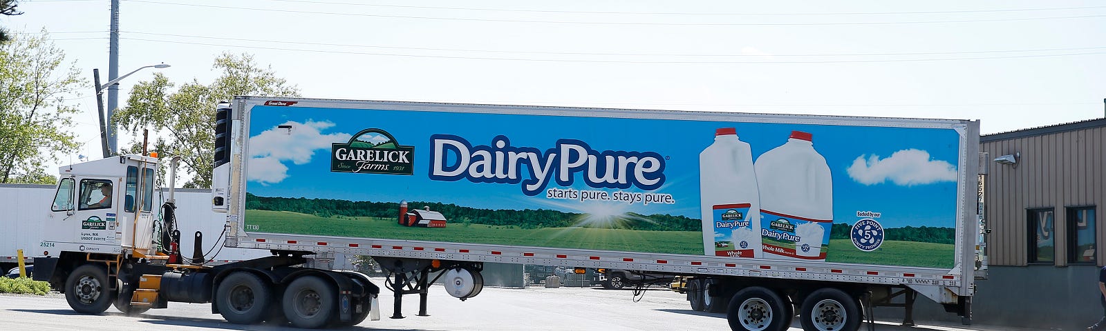 A milk truck pulls away from the Garelick Farms manufacturing plant in Lynn, MA. The plant closed in fall of 2018.