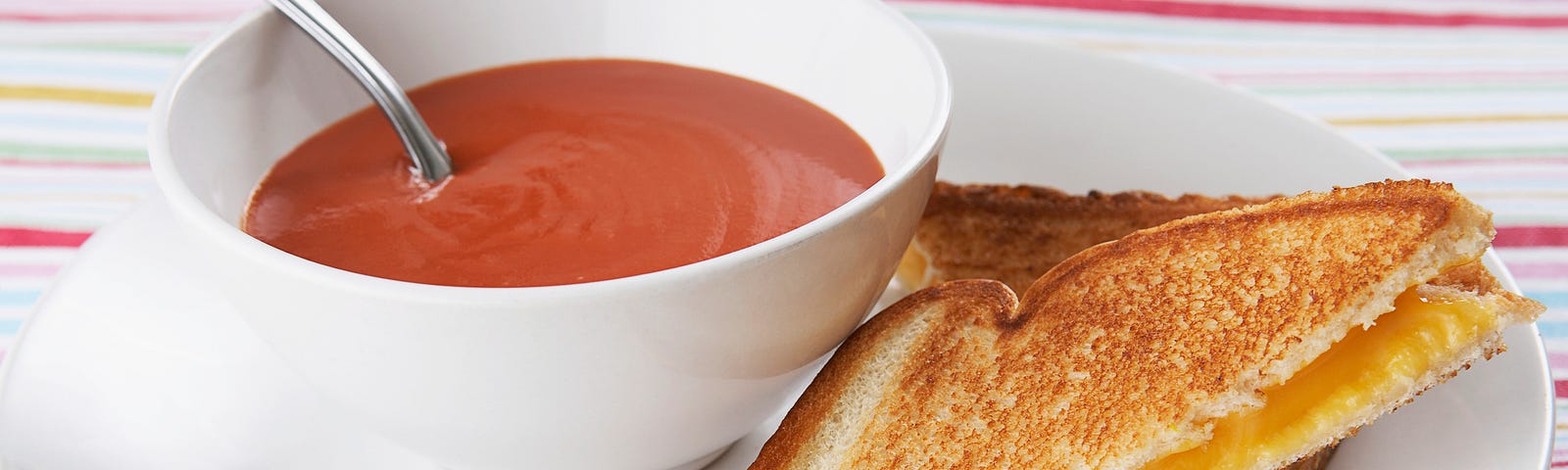 Grilled cheese sandwich and tomato soup.