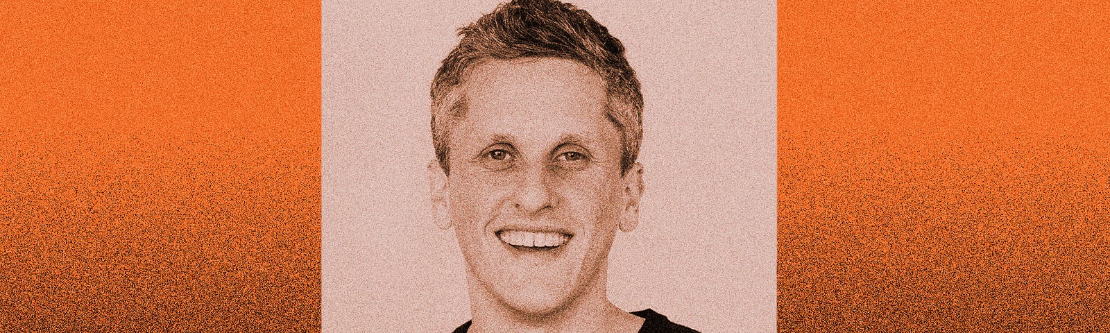 A photo of Aaron Levie against an orange gradient to black background.