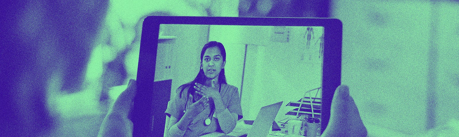 A woman holds up a digital tablet and talks to a doctor over teleconference.