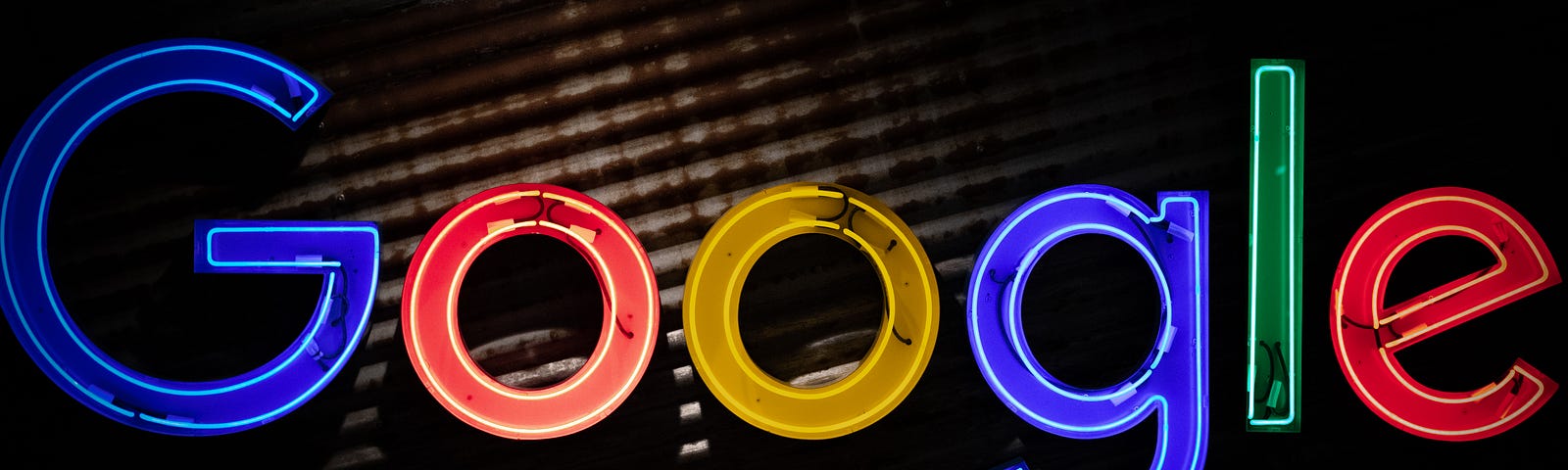 A photo of a neon Google logo.