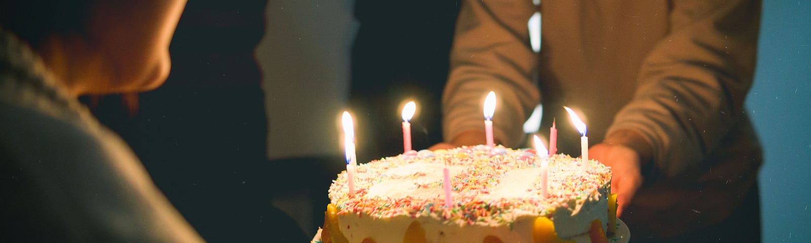 Birthday cake with candles for a woman.