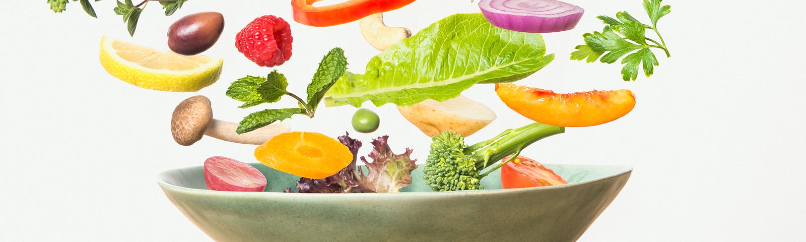 Individual parts of a salad (lettuce, olives, peppers, asparagus, etc) flying out of a salad bowl.