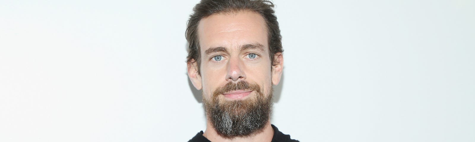 A close up of Twitter’s CEO, Jack Dorsey against a white background.