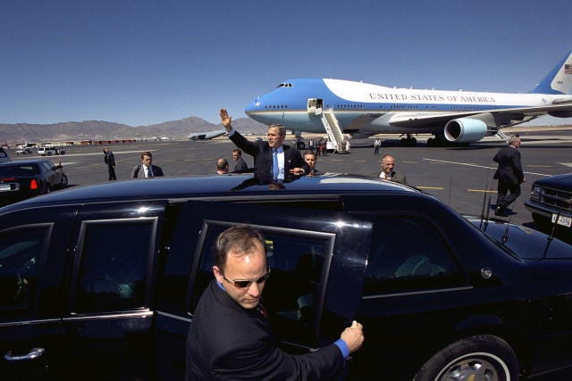 President George W. Bush with the Secret Service