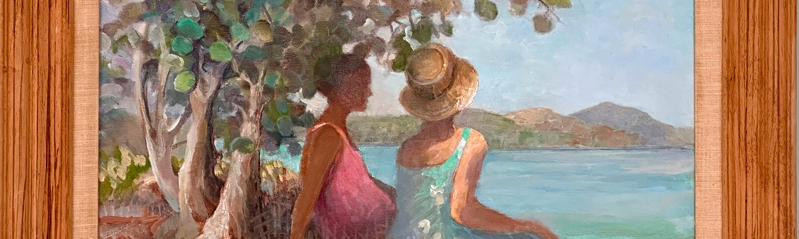 Oil painting of a young black woman and mature white woman, both in sun dresses. Sitting in the sand under the shade of a Seagrape tree on a beach in the tropics, ooking out at the turquoise-colored sea.