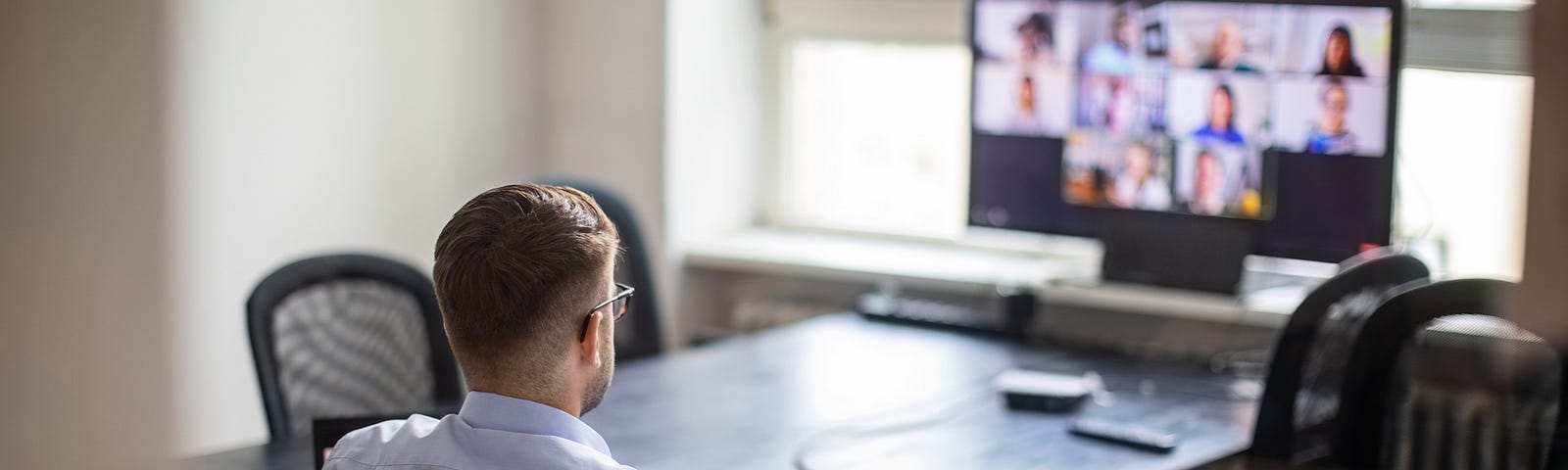 Manager on a video call with his team.