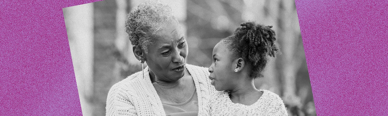 Black and white photo of a Black grandma and granddaughter against a violet background.