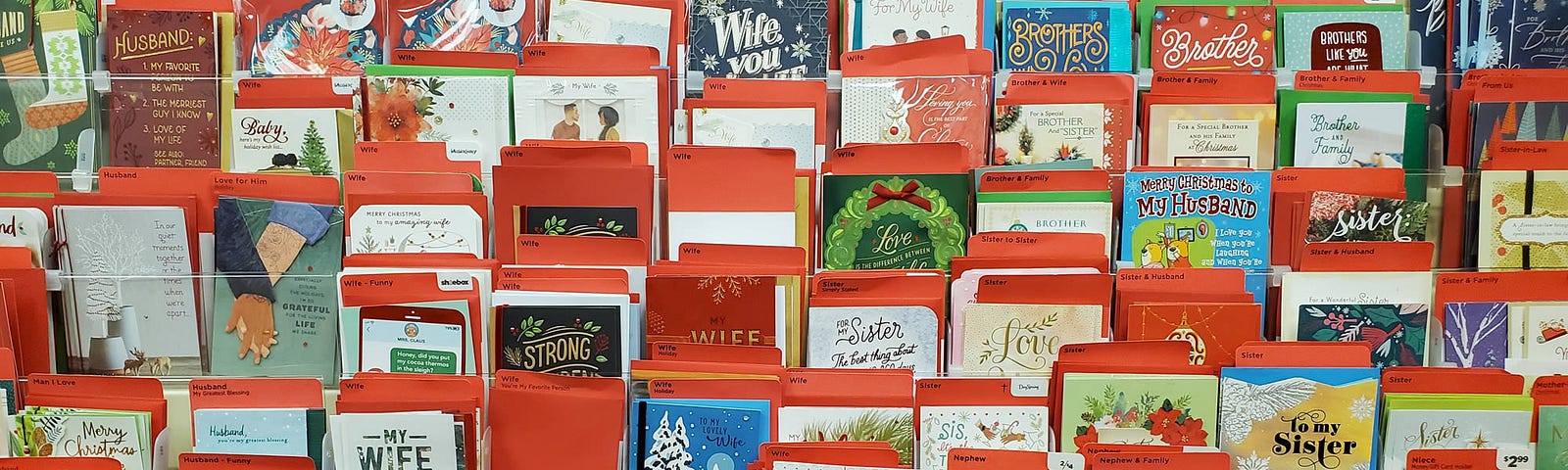 Image of Christmas card rack at local Hallmark store week before Christmas