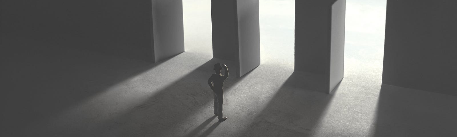 A silhouette of a business man contemplating while standing in front of three open doors.