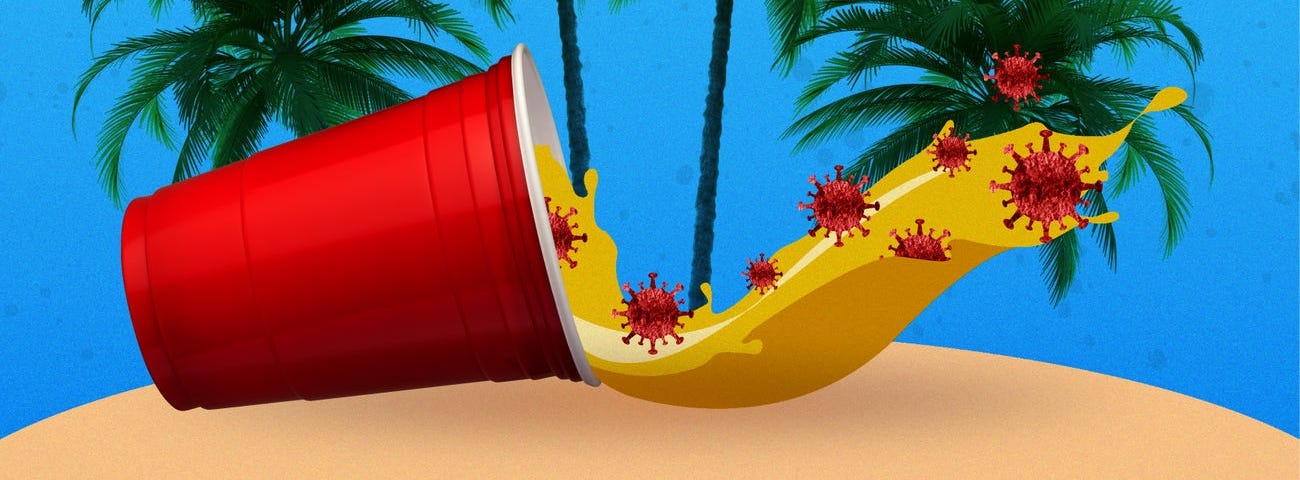 A red solo cup in front of palm trees.