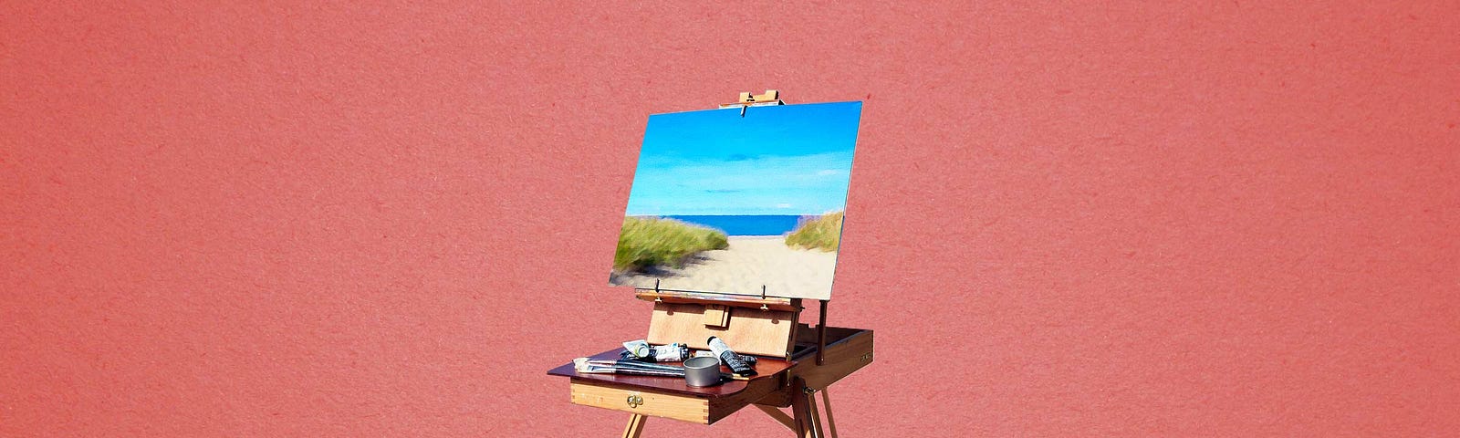 An image of a painting of a beach on an easel.