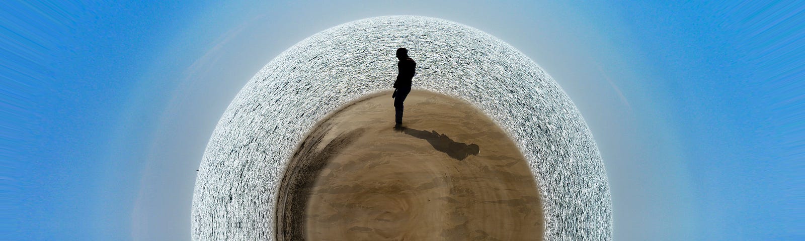 A photo of a man standing in a sphere desert.