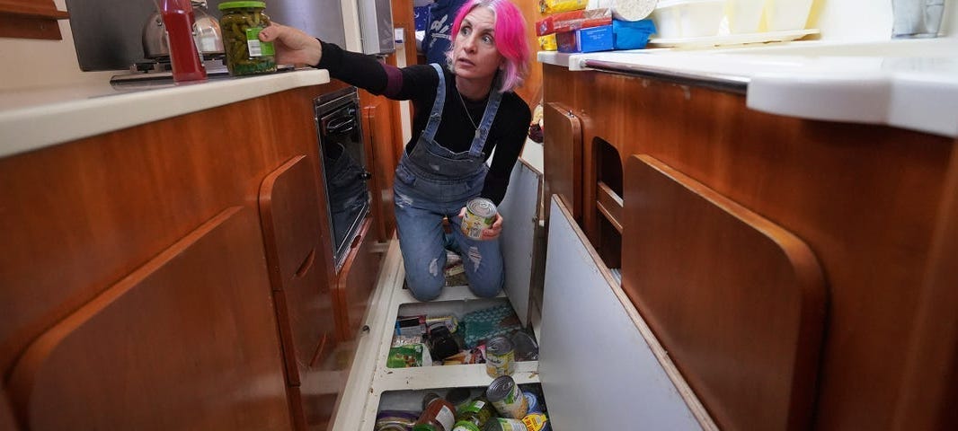 Jessica Sueiro filling the storage space in her galley kitchen.