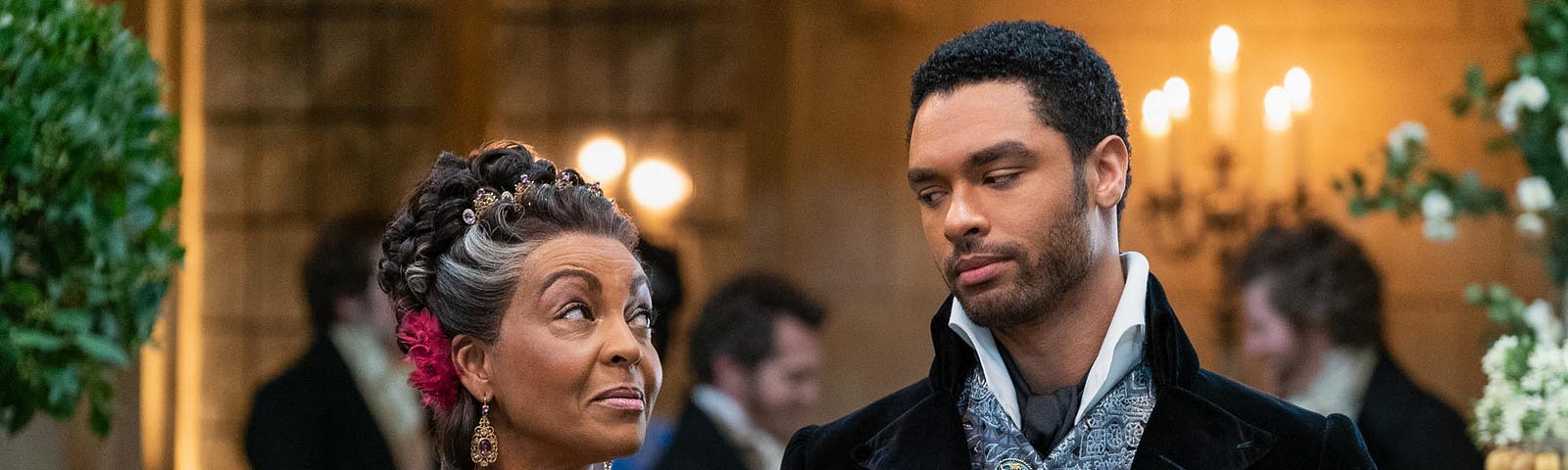 Adjoa Andoh and Regé-Jean Page in Bridgerton | Netflix