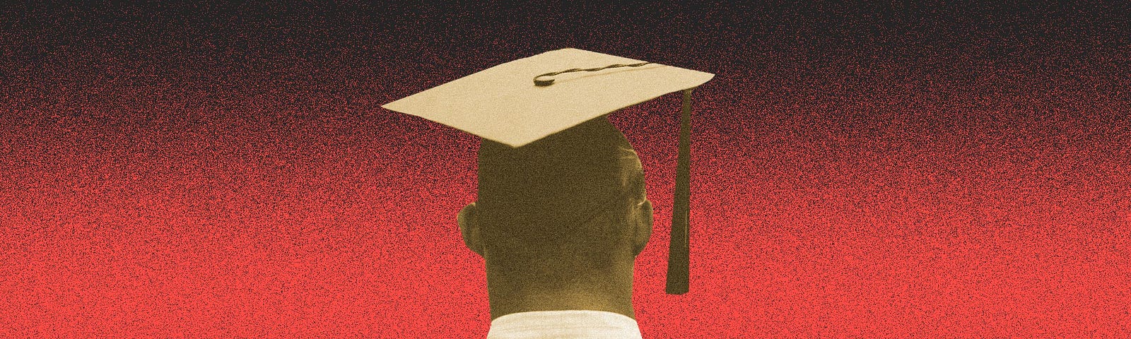 Rear view of an African American male college student wearing a cap and gown.