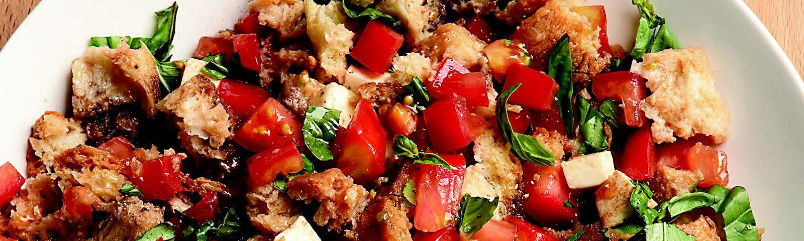 A large bowl of Tomato, Mozzarella, and Bread Salad.