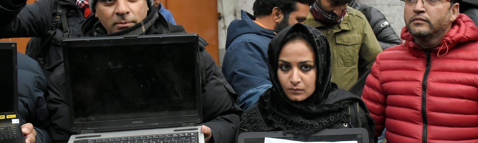 Kashmiri journalists protest against the continuous internet blockade for the 100th day outside of the Kashmir press club.