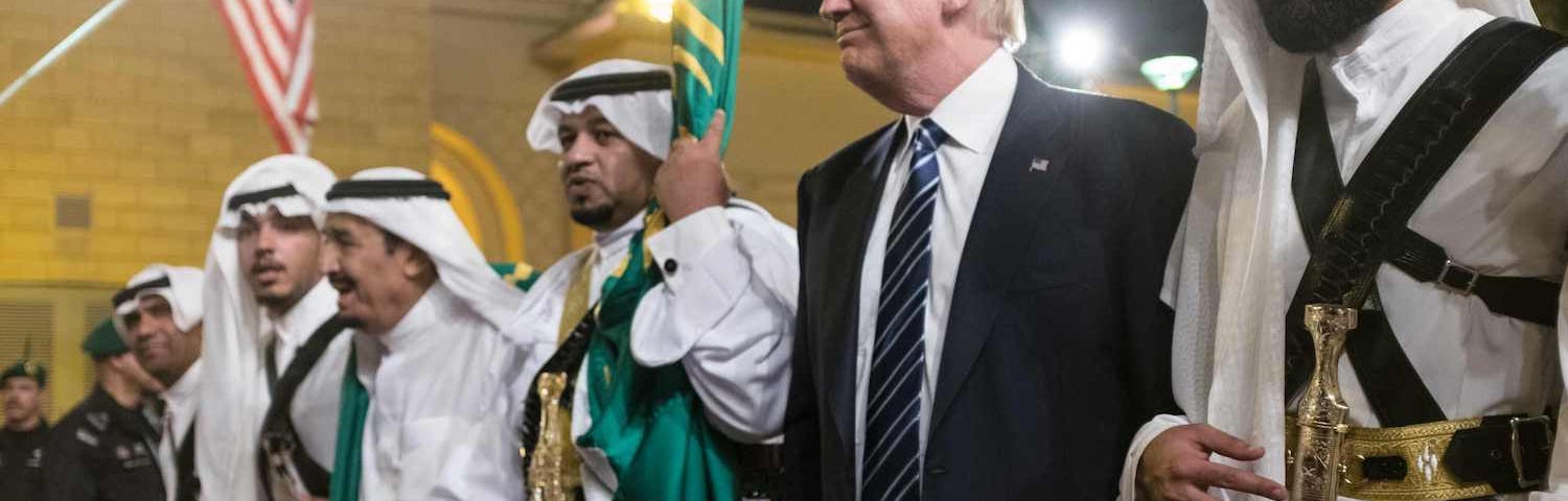 U.S. President Donald Trump brandishes a sword during a welcome ceremony in Riyadh, Saudi Arabia on May 20, 2017. (Mandel Ngan/AFP/Getty Images)