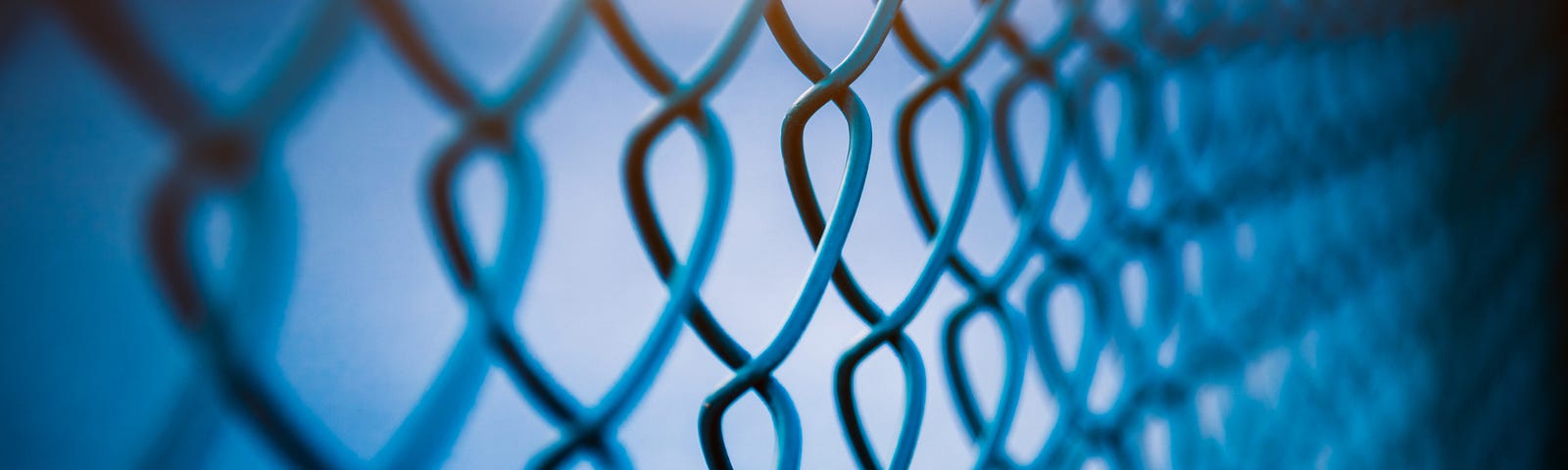 A filtered photo of a chain link fence.