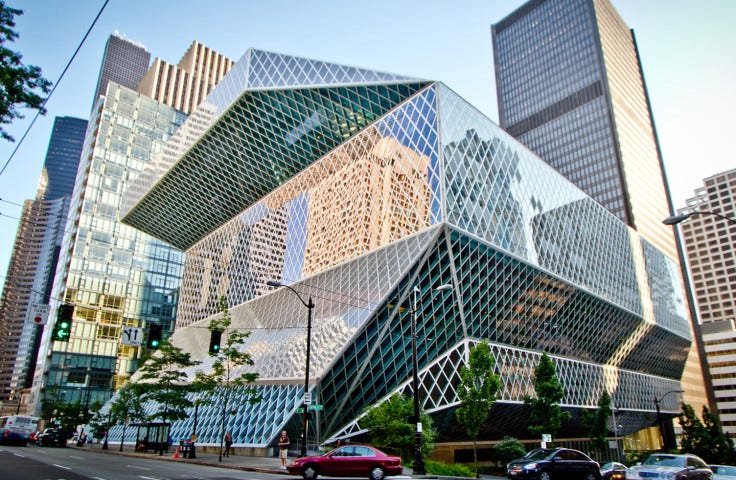 An exterior shot of the Seattle public library building.