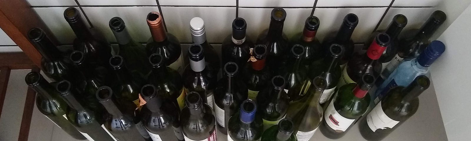 A collection of empty wine bottles