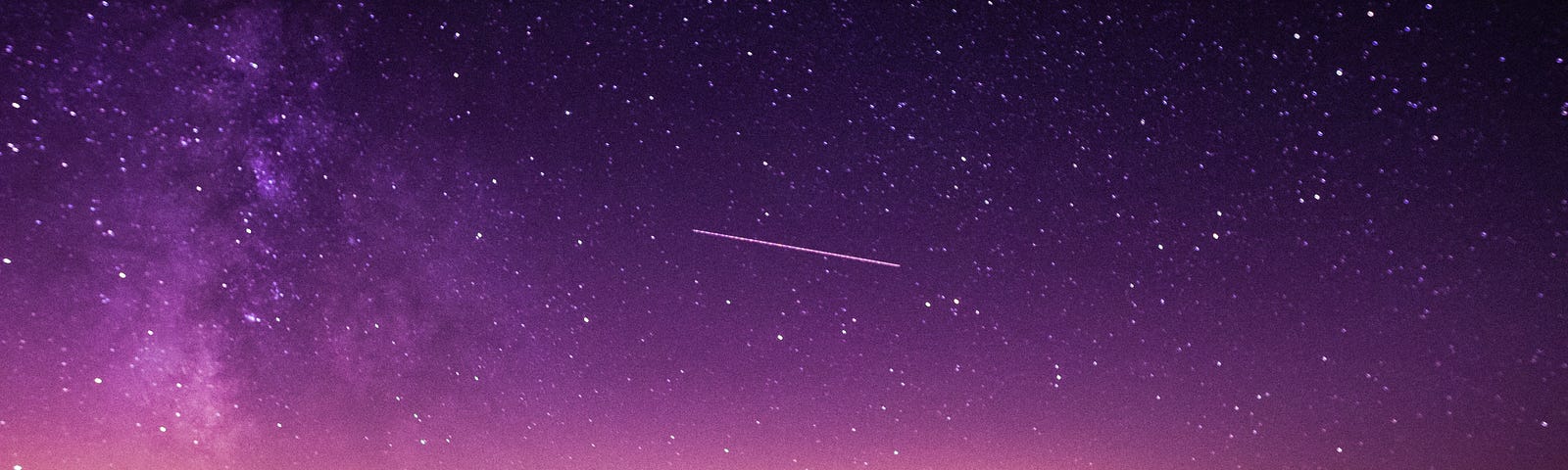 Purplish night sky with stars.