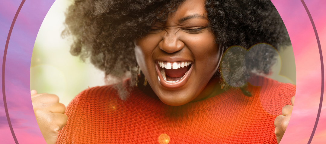 An excited Black woman enjoying her success. Cover image for habits of successful people.