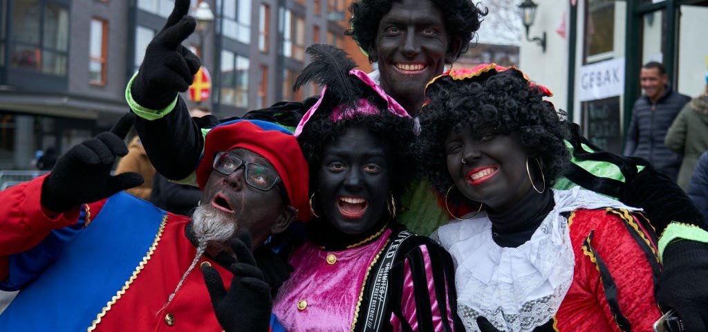 Celebrators of Zwarte Piet are dressed up in blackface.