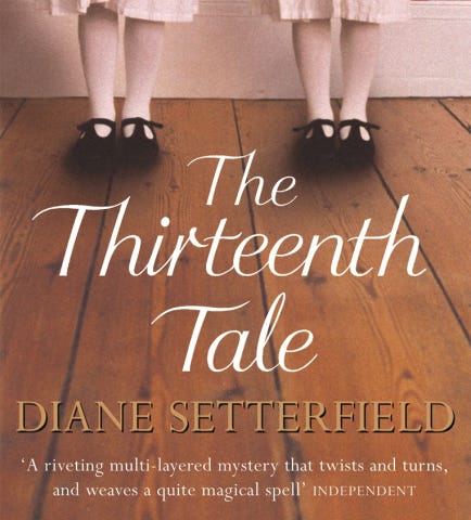 thirteenth tale book cover version bottom half two young female twins with matched white cotton dresses black mary jane shoes