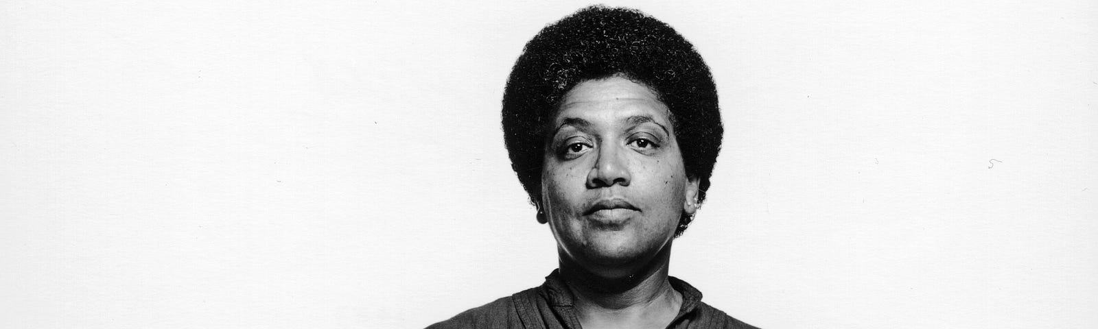 Black and white photo of Audre Lorde in 1983.