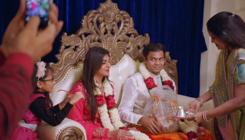 A screenshot of Radhika and Akshay during their engagement ceremony from the Netflix show “Indian Matchmaking.”