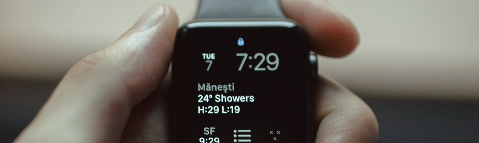 selective focus photography of space black aluminium case Apple Watch displaying 7:29