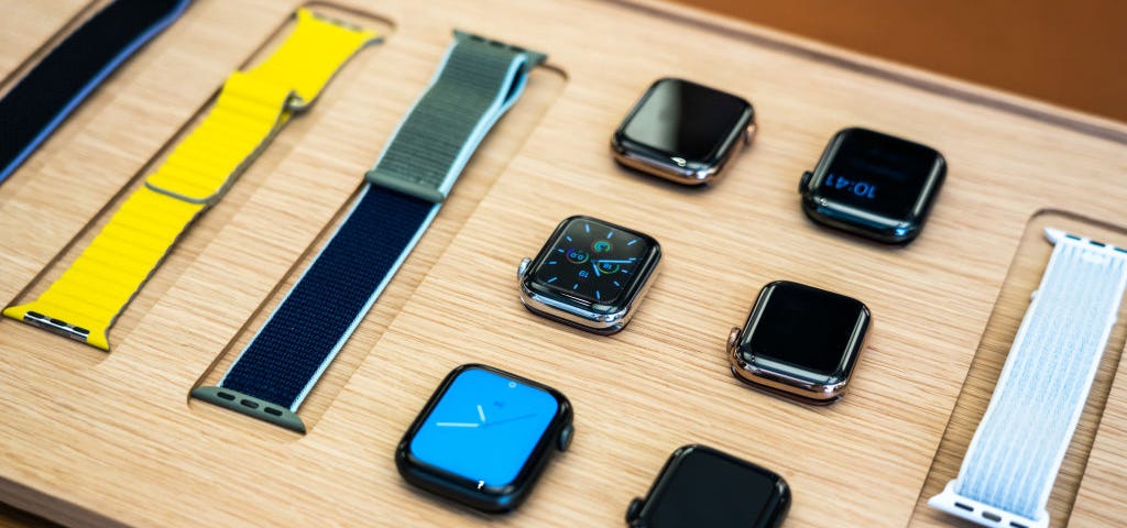 A photo of a disassembled Apple watch on display at a store.