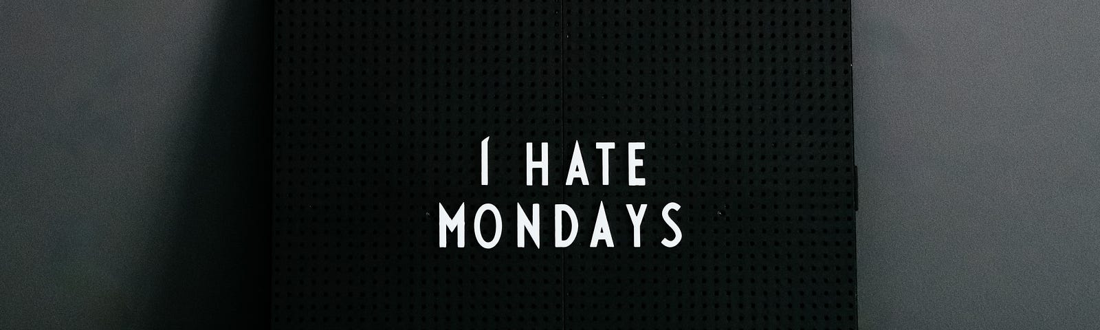 Photo of the sign “I hate Mondays”