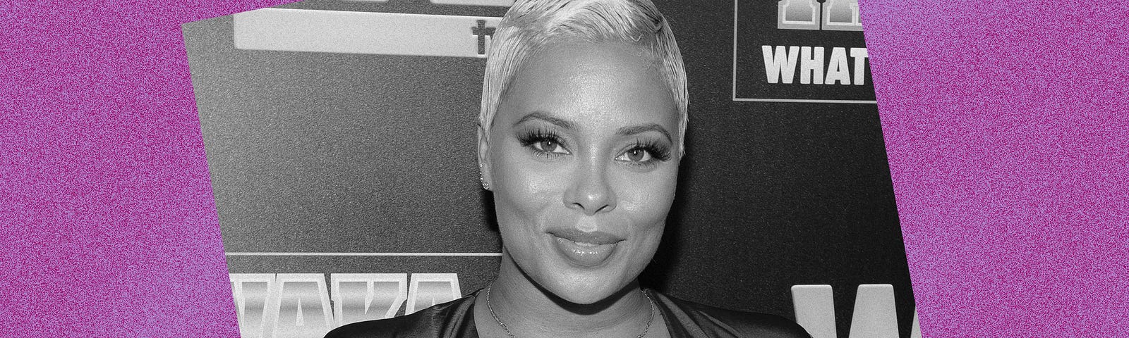 Black and white photo of Eva Marcille against a violet background.