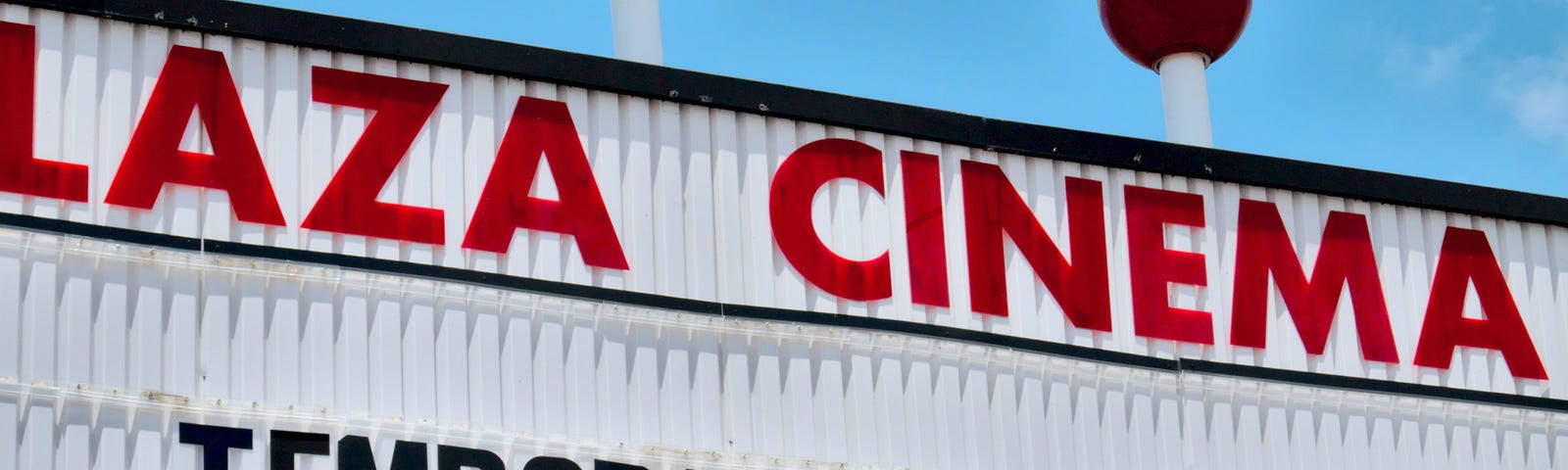 A marquee reading, “Plaza Cinema: Temporarily closed.”