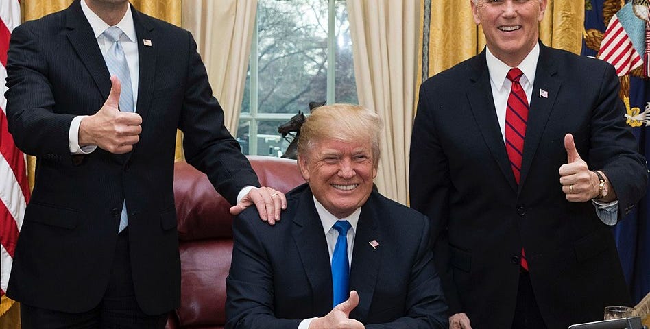 Donald Trump in the Oval Office with Paul Ryan and Mike Pence