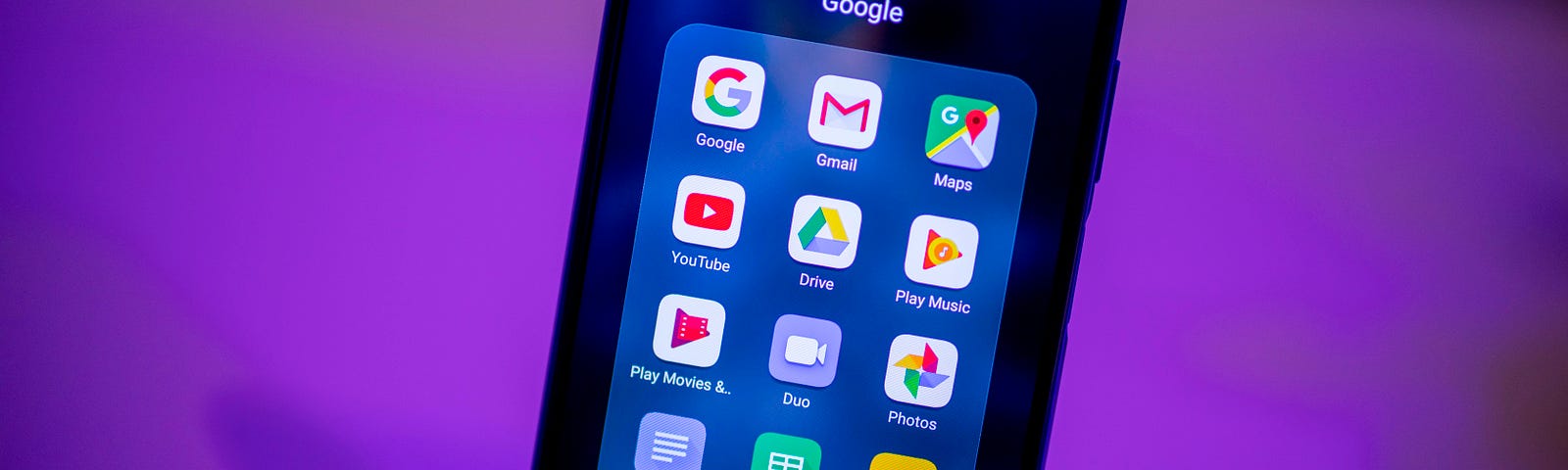 A suite of Google apps are seen on a smartphone display.